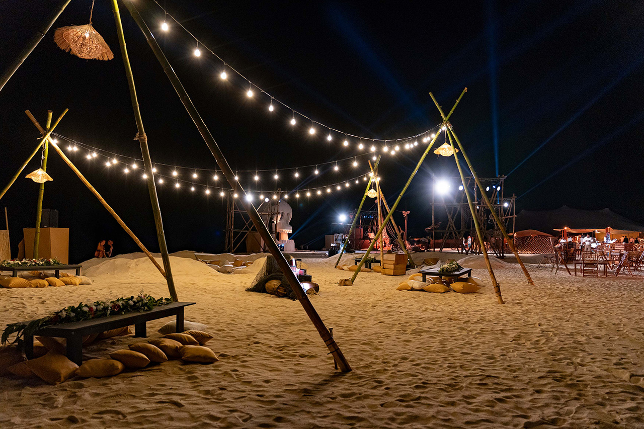 ipg-beach-event-night-party-string-lights-bamboo-structures-mauritius.jpg