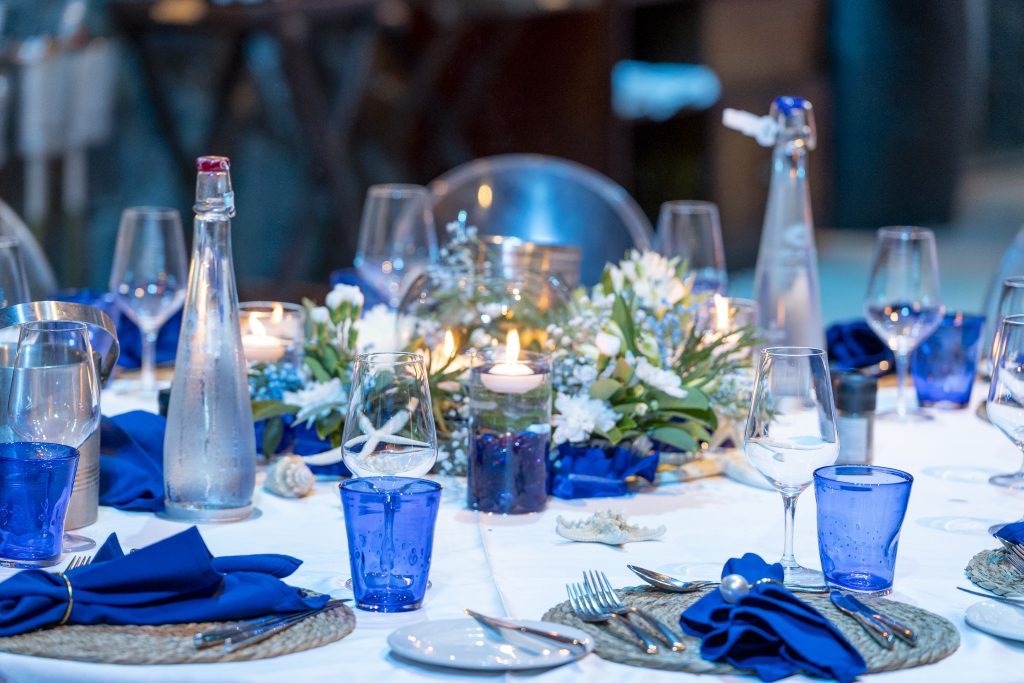 Sea-themed welcome dinner Mauritius with elegant coastal décor and serpentine tables

Sea-themed welcome dinner Mauritius designed by Impact Production Group at Shandrani Beachcomber

Luxury sea-themed welcome dinner Mauritius featuring blue lighting and marine-inspired tablescape