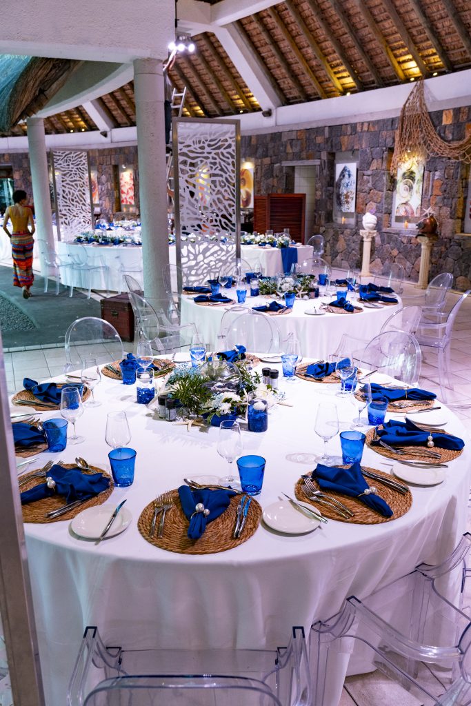 Sea-themed welcome dinner Mauritius with elegant coastal décor and serpentine tables

Sea-themed welcome dinner Mauritius designed by Impact Production Group at Shandrani Beachcomber

Luxury sea-themed welcome dinner Mauritius featuring blue lighting and marine-inspired tablescape