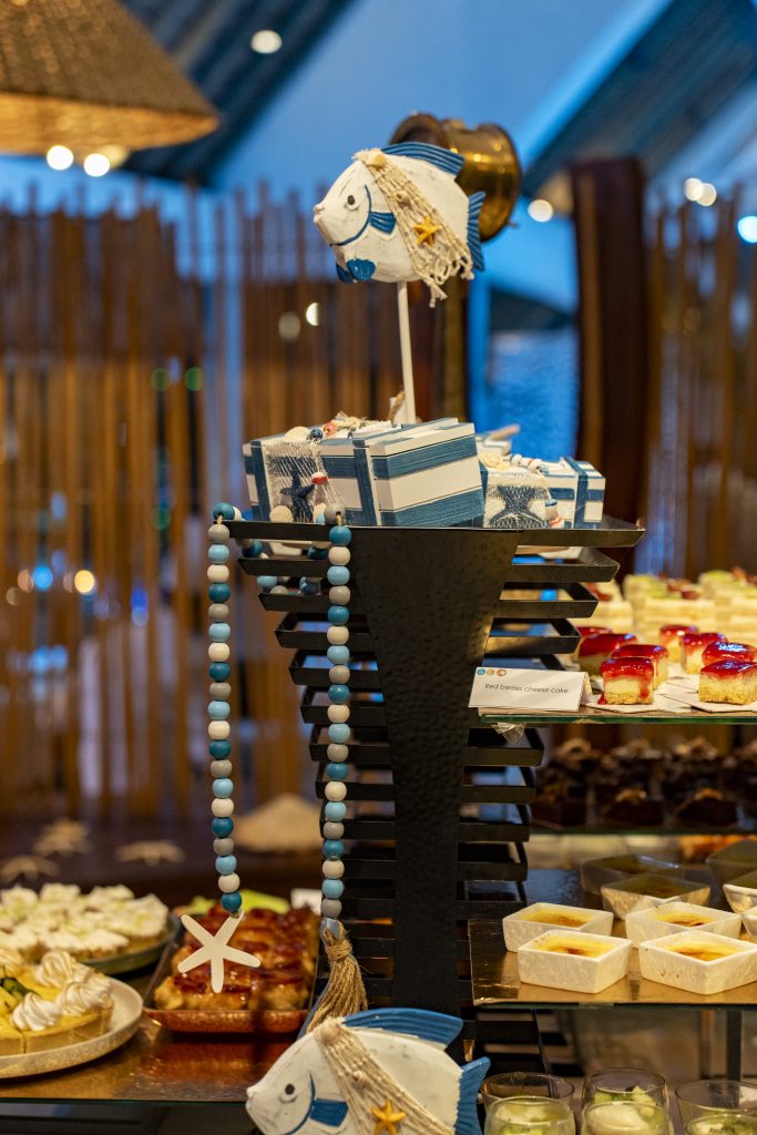 Sea-themed welcome dinner Mauritius with elegant coastal décor and serpentine tables

Sea-themed welcome dinner Mauritius designed by Impact Production Group at Shandrani Beachcomber

Luxury sea-themed welcome dinner Mauritius featuring blue lighting and marine-inspired tablescape