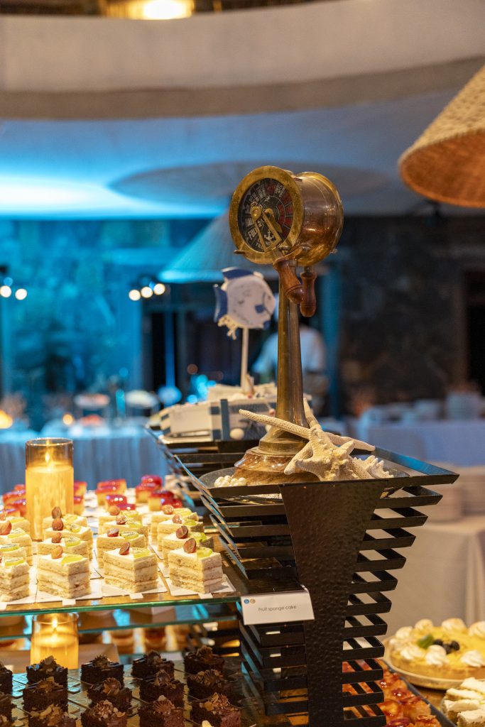 Sea-themed welcome dinner Mauritius with elegant coastal décor and serpentine tables

Sea-themed welcome dinner Mauritius designed by Impact Production Group at Shandrani Beachcomber

Luxury sea-themed welcome dinner Mauritius featuring blue lighting and marine-inspired tablescape