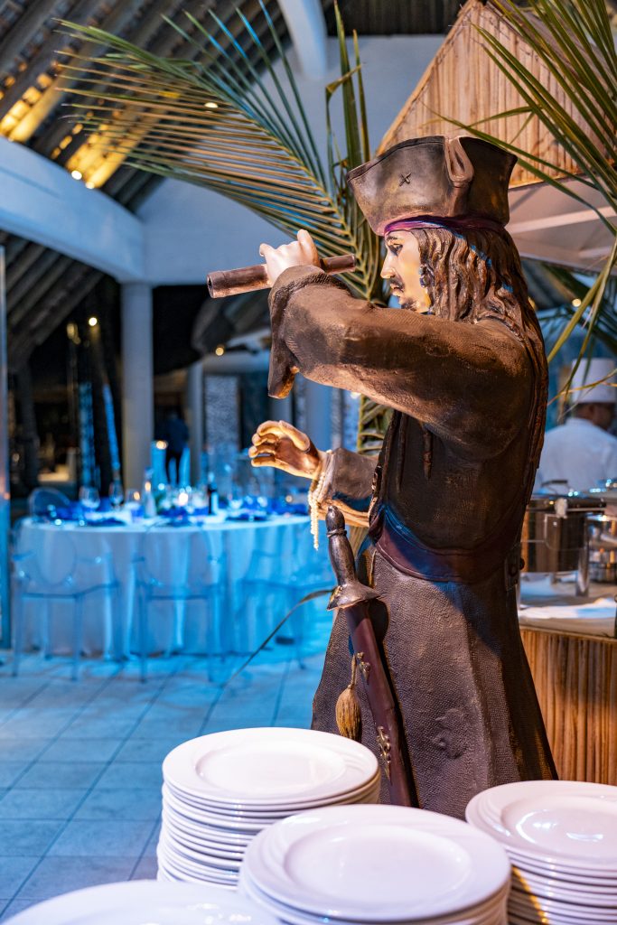 Sea-themed welcome dinner Mauritius with elegant coastal décor and serpentine tables

Sea-themed welcome dinner Mauritius designed by Impact Production Group at Shandrani Beachcomber

Luxury sea-themed welcome dinner Mauritius featuring blue lighting and marine-inspired tablescape